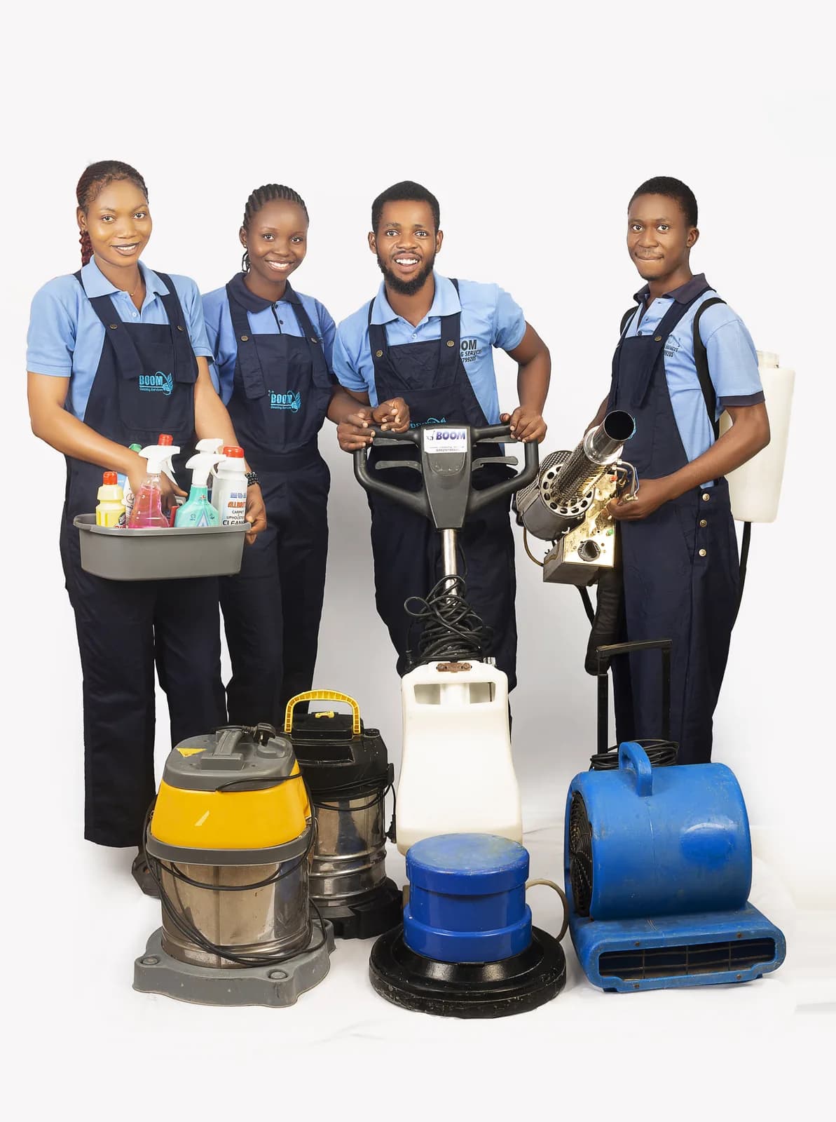 Four BOOM team members with floor, upholstery and fumigation equipment